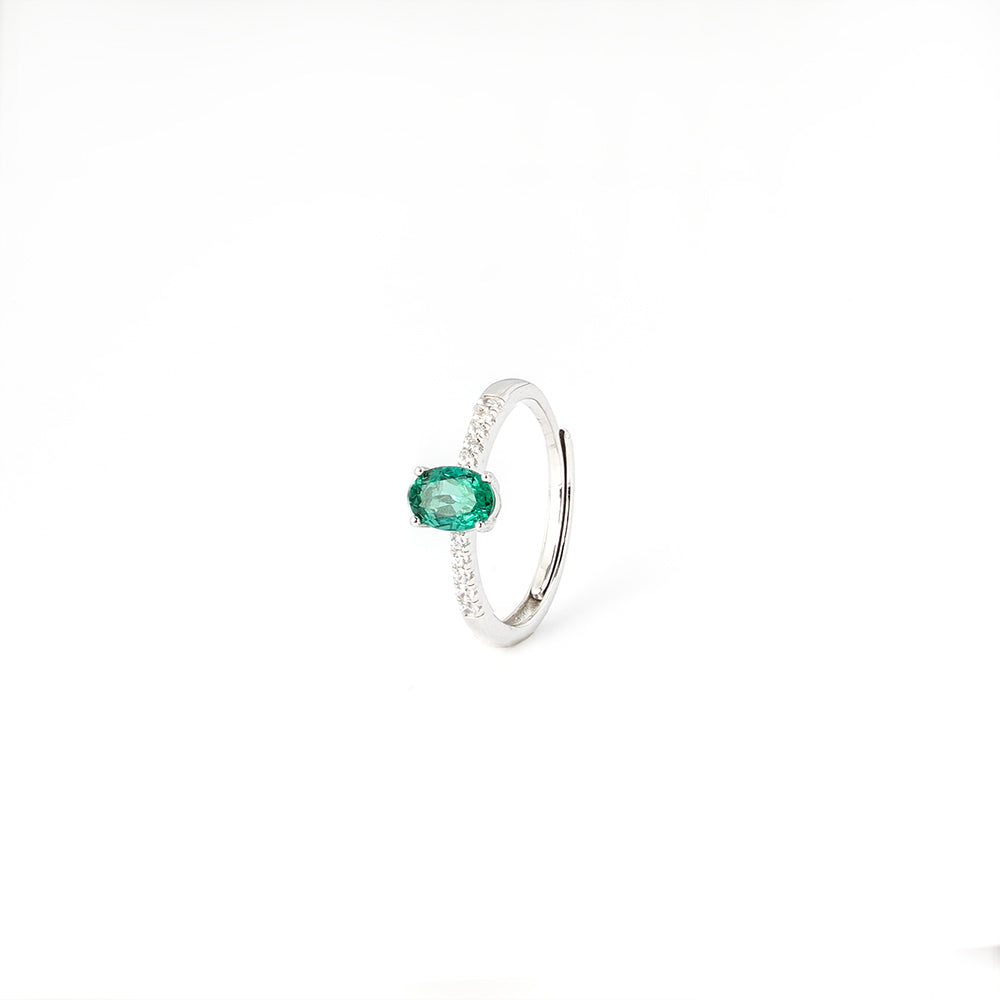 The Emerald Solitaire green gemstone ring detail by Iris & Carly
