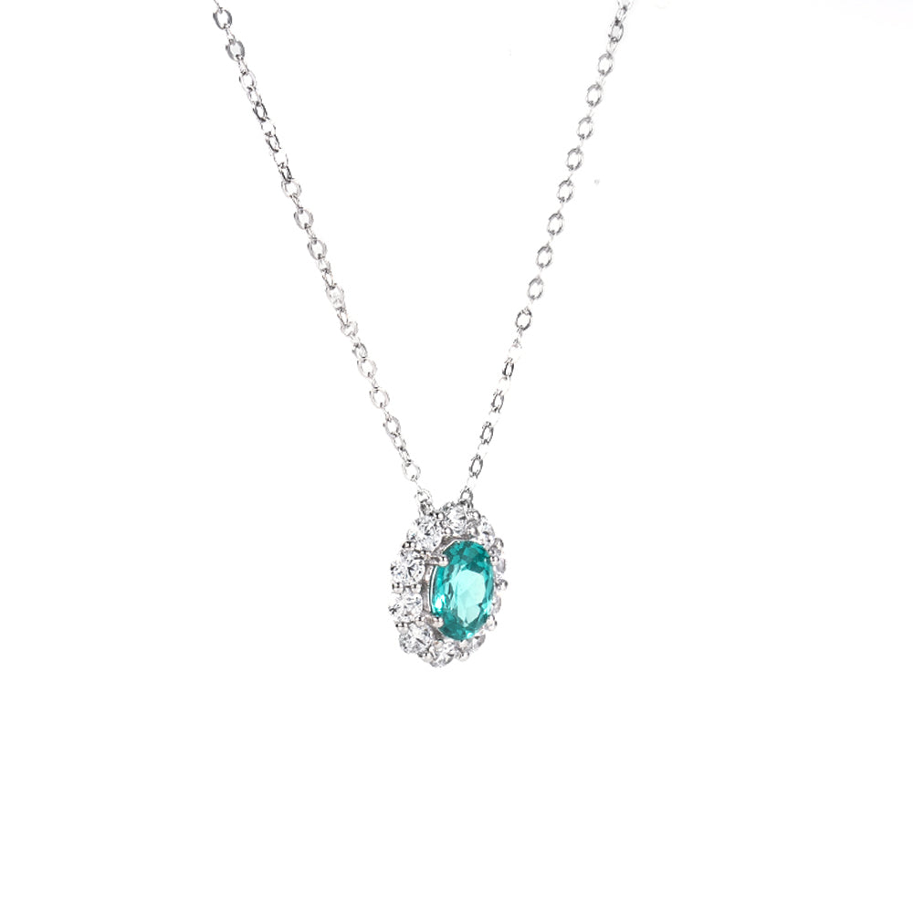 The Neon Lagoon Necklace blue gemstone pendant by Iris & Carly