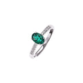 The Emerald Solitaire emerald-green gemstone ring in sterling silver by Iris & Carly