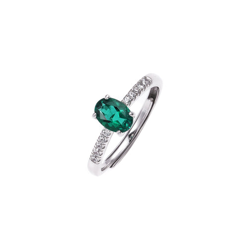The Emerald Solitaire emerald-green gemstone ring in sterling silver by Iris & Carly