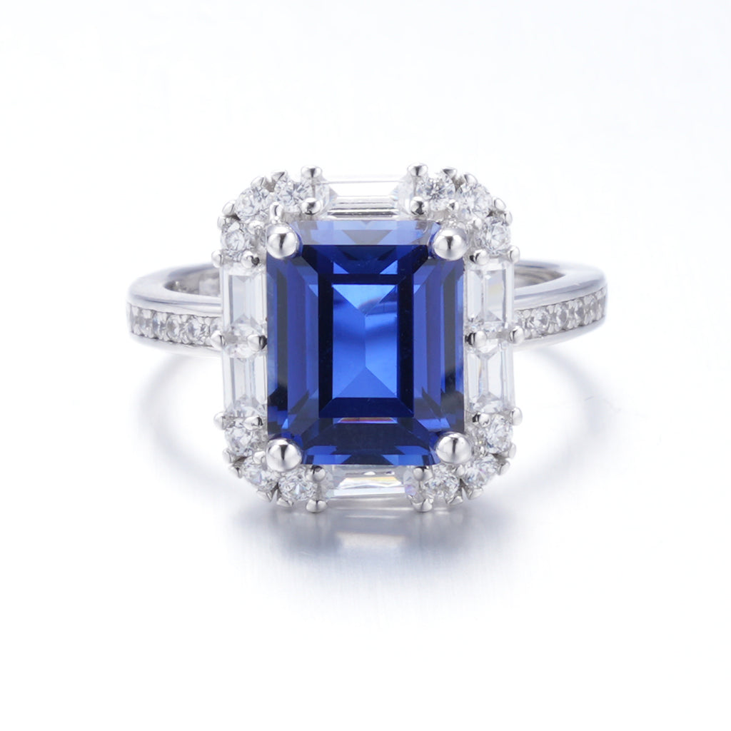The Modern Halo — emerald-cut blue sapphire ring with halo setting in 925 sterling silver