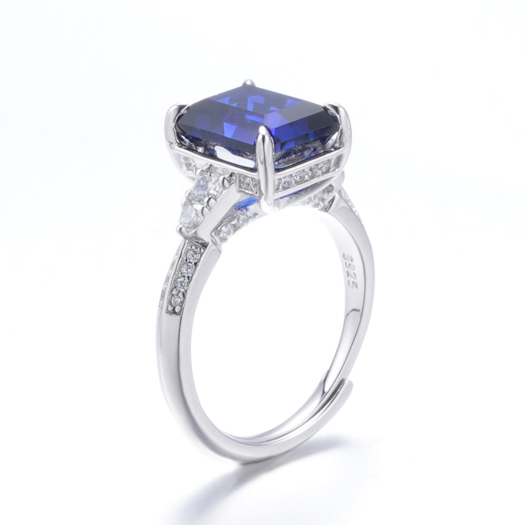 The Sapphire Statement — 4.2ct emerald-cut blue sapphire ring in 925 sterling silver