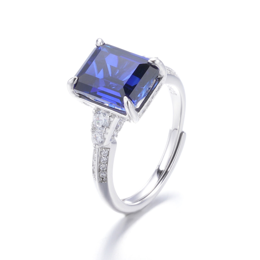 The Sapphire Statement — 4.2ct emerald-cut blue sapphire ring in 925 sterling silver