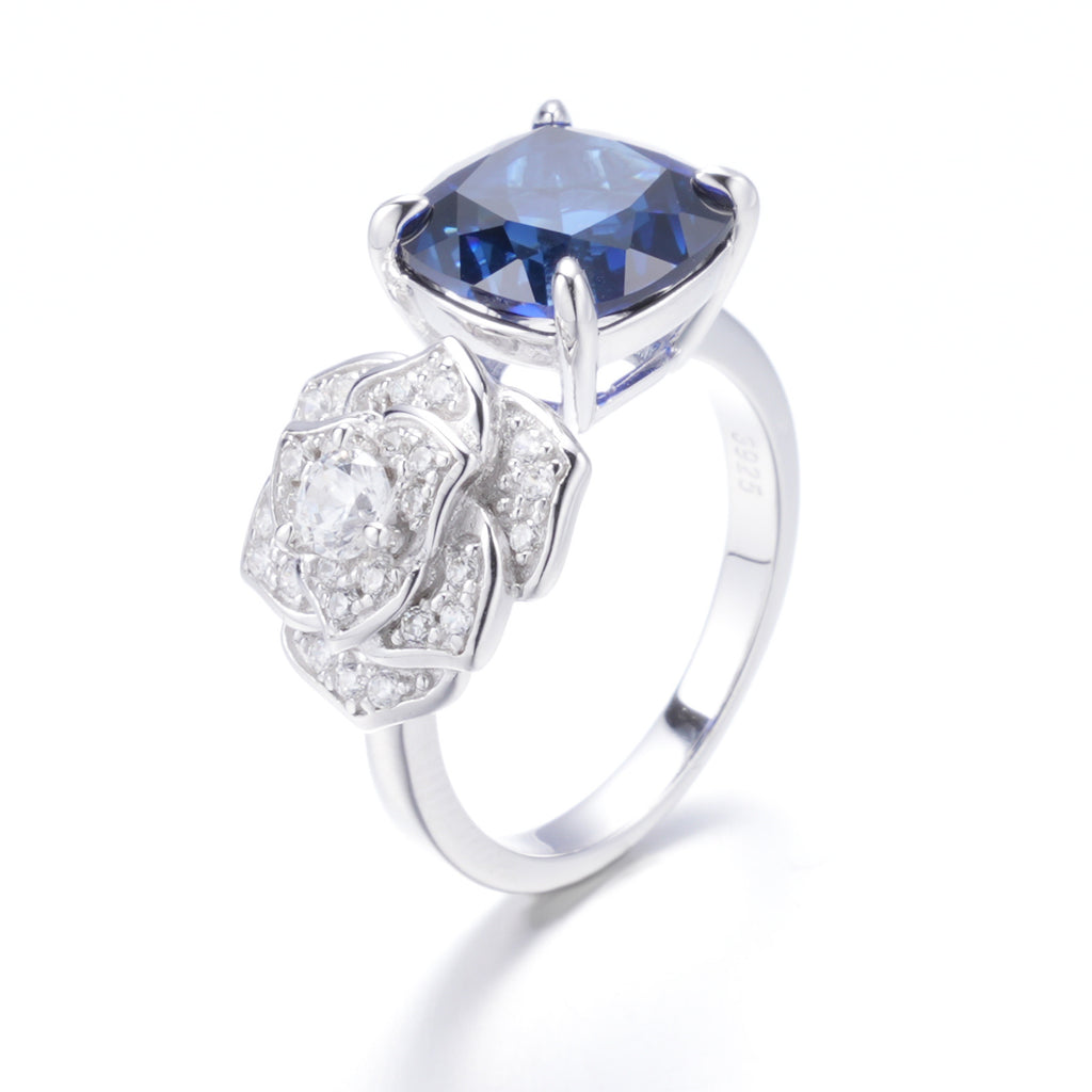 The Twilight Toi Et Moi — cushion-cut blue sapphire ring with pavé rose motif in 925 sterling silver