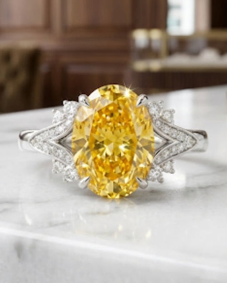 Yellow stone piece worn on the hand