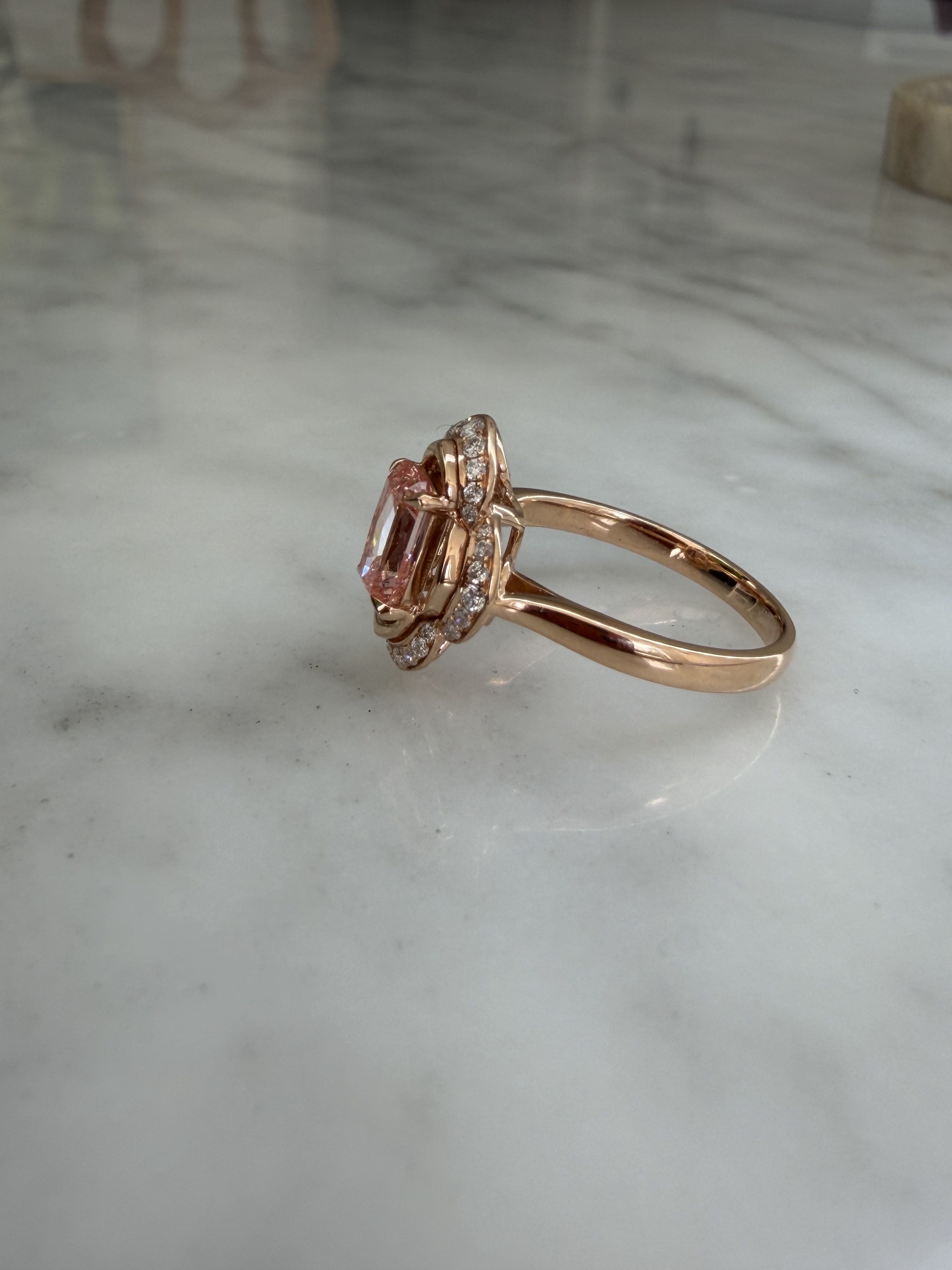 Side profile of The Pink Blossom showing the 18K rose gold band and petal halo silhouette