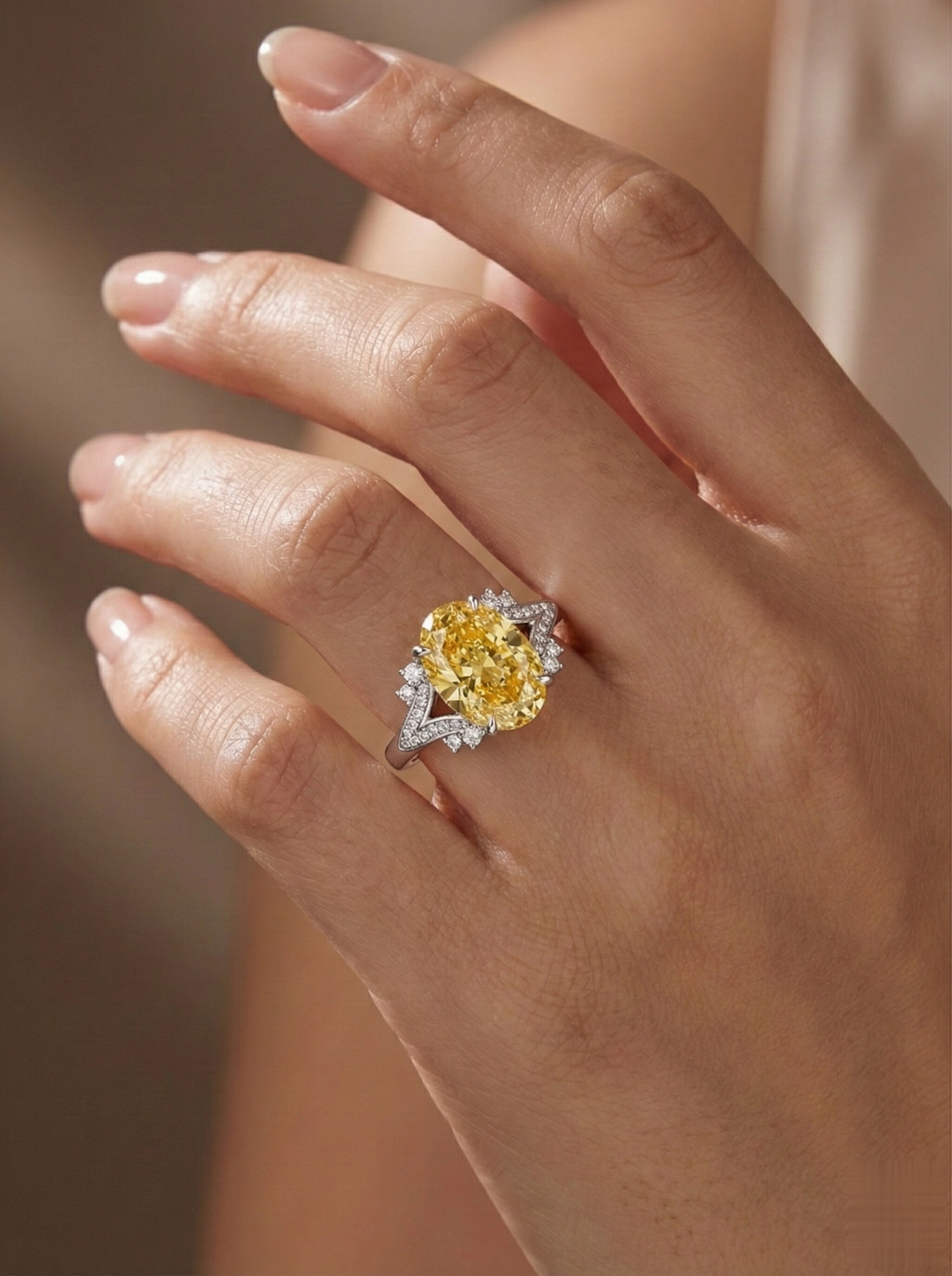 The Sunburst yellow diamond ring worn on hand, lifestyle shot