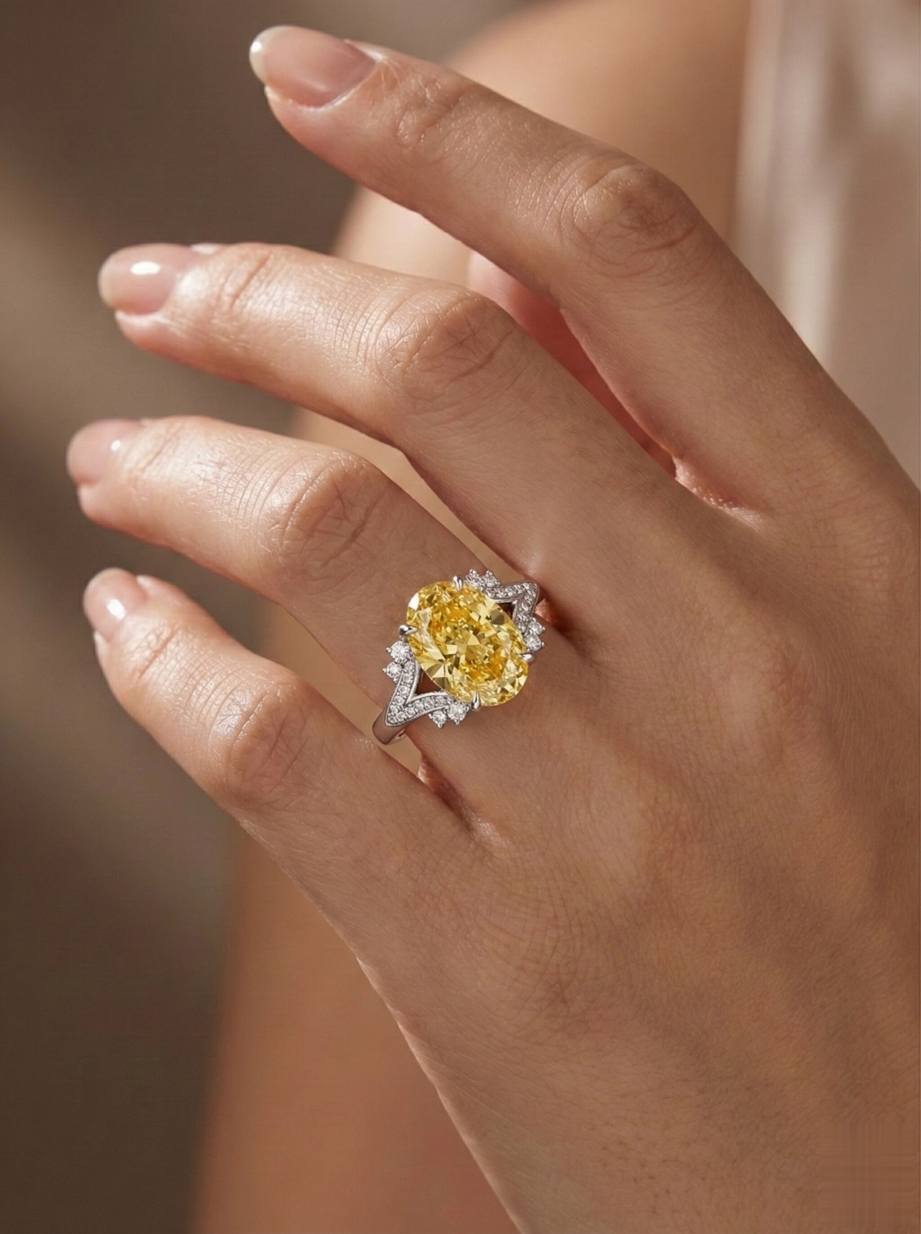 The Sunburst yellow diamond ring worn on hand, lifestyle shot